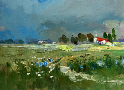 A vibrant impressionist painting of a rolling green field under a dramatic sky, featuring bold brushstrokes and scattered blue flowers.