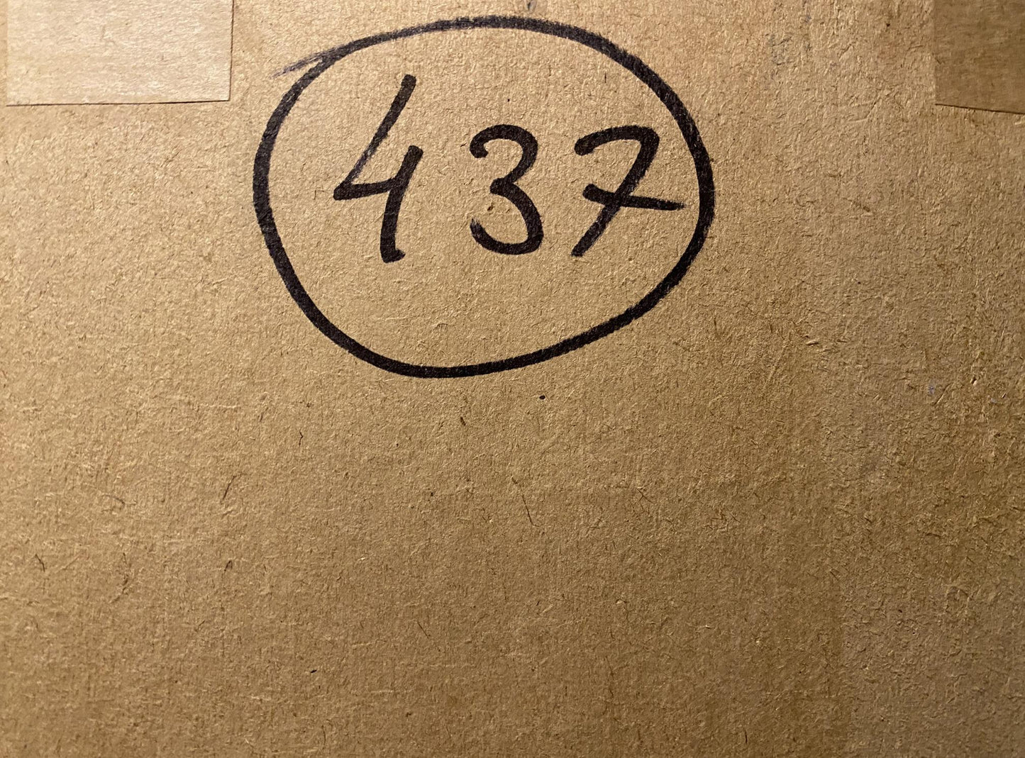 Back of Oil painting Street in Bakhchisarai by Mikhail Kobylenkov with circled black handwritten 437 on cardboard