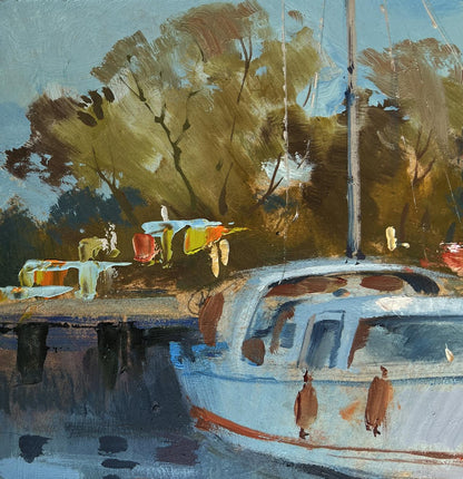 Oil painting of light blue sailboat with red hull stripe by Yuriy Suprunchuk