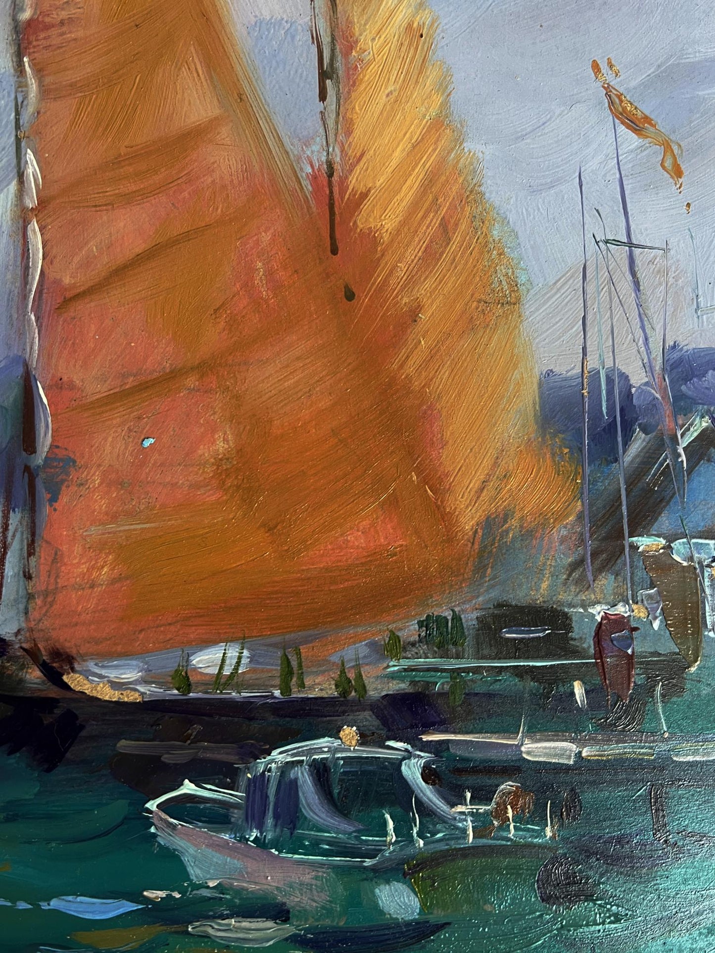 Oil painting of sea ships at pier with vibrant orange sail by Yuriy Suprunchuk