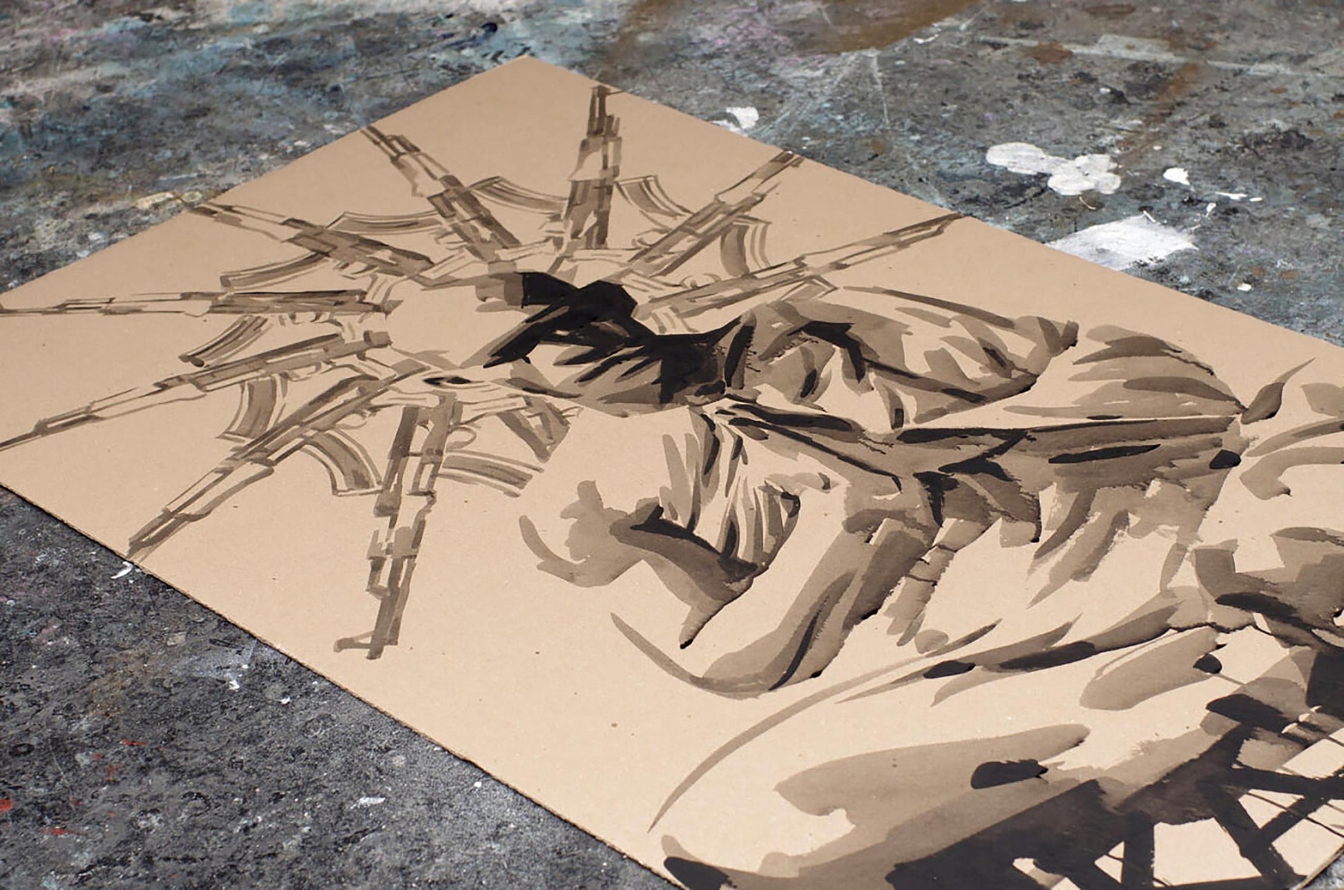 Sepia stencil art by Karma Dima Filatov: figure with rifles on tan cardboard