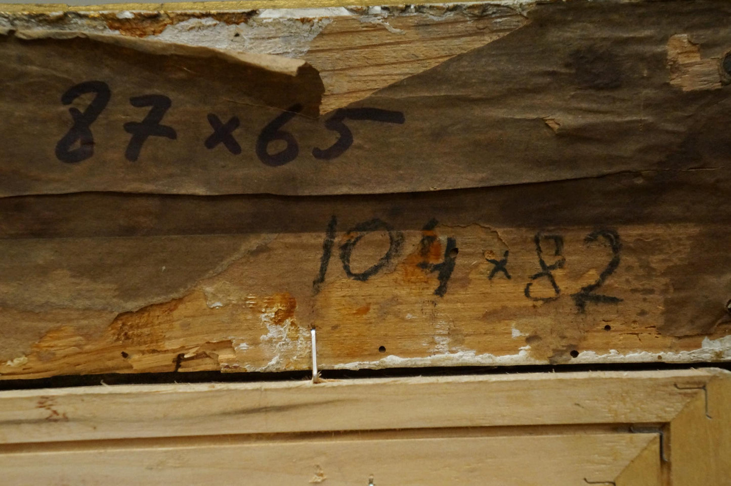 Back of Tsvetkova Valentina Petrovna oil painting with weathered wooden panel and faded marker measurements