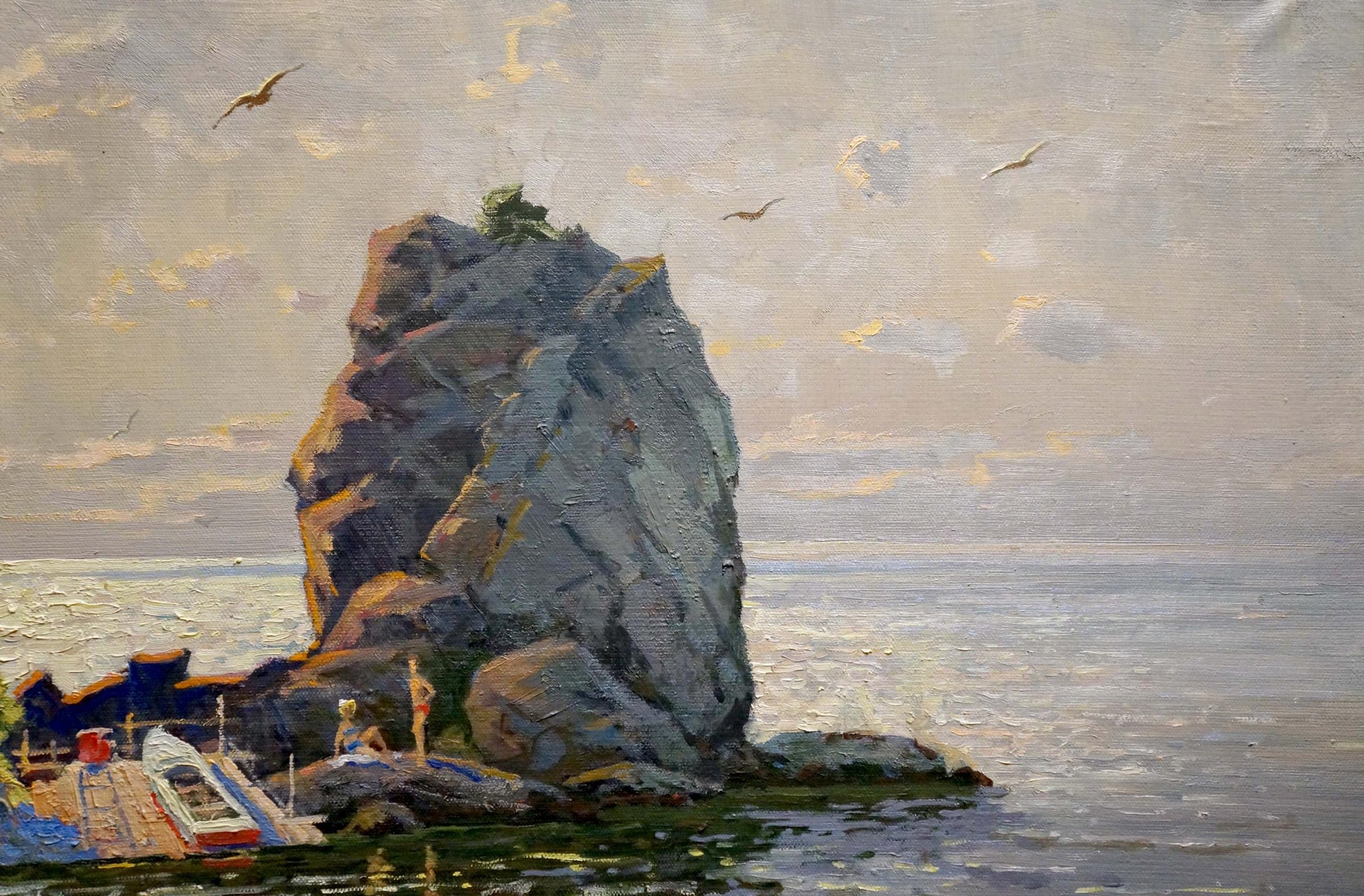 Oil painting seascape of towering gray rock formation with tree by dock