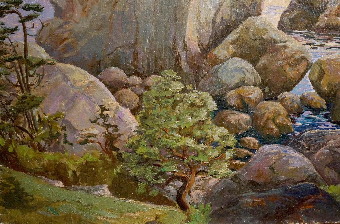 Oil painting of gnarled green tree among rocks by rippling coastal water