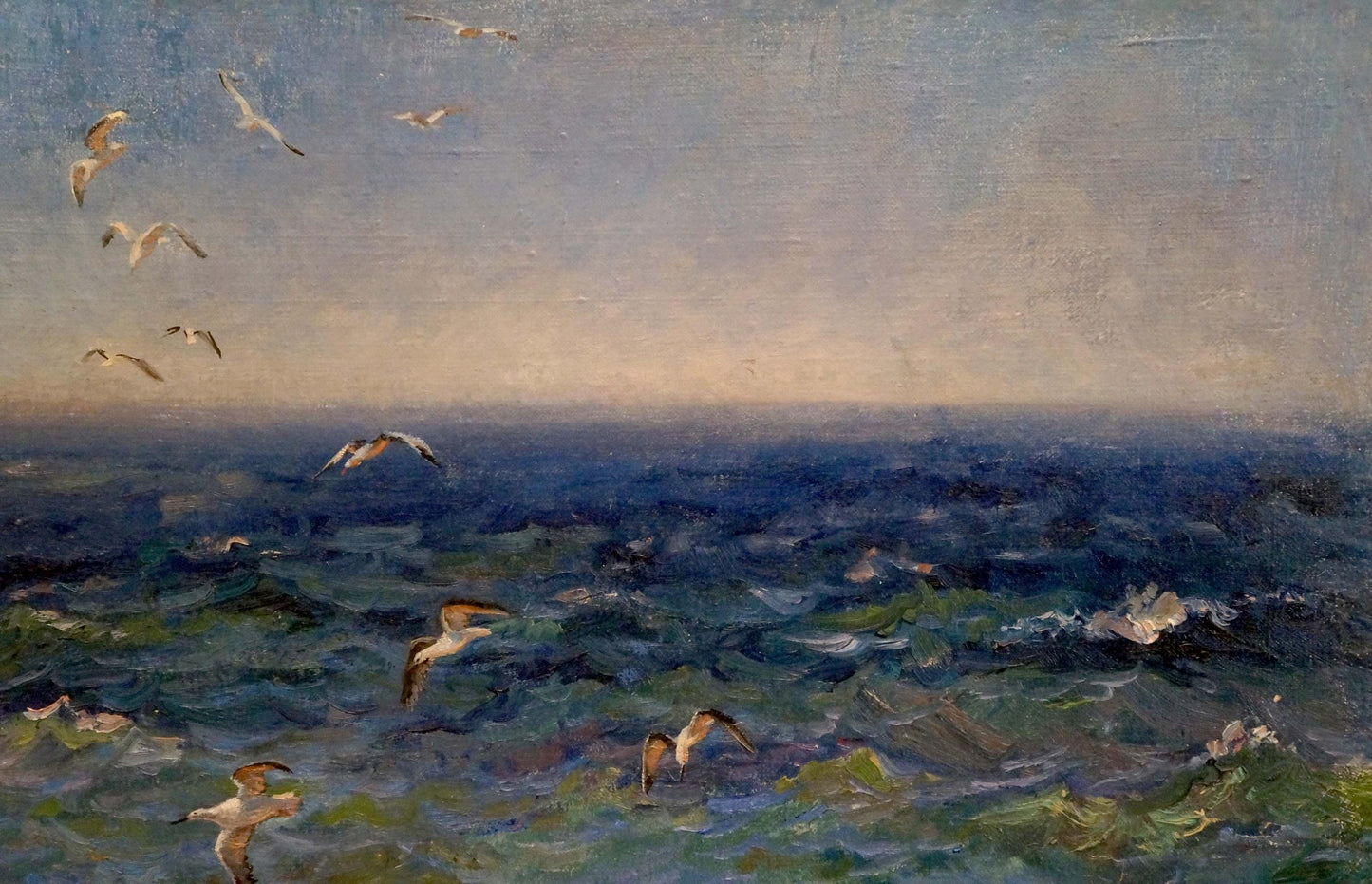 Oil painting of seagulls over turbulent sea by Basov Yakov Alexandrovich