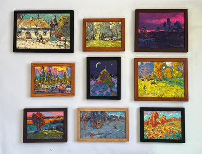Nine colorful impressionistic landscapes in frames on white wall for wholesale