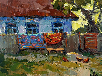 Oil painting Evening has come by Oksana Ivanyuk: vibrant blue house with red roof