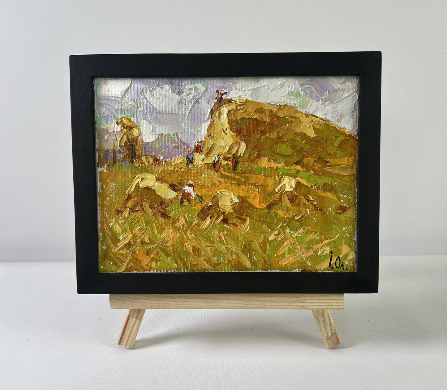 Oil painting Work in the Field by Oleksiy Ivanyuk in black frame