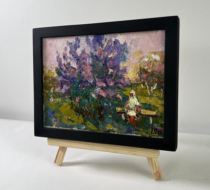 Oil painting On a walk near the lilacs by Oksana Ivanyuk on easel