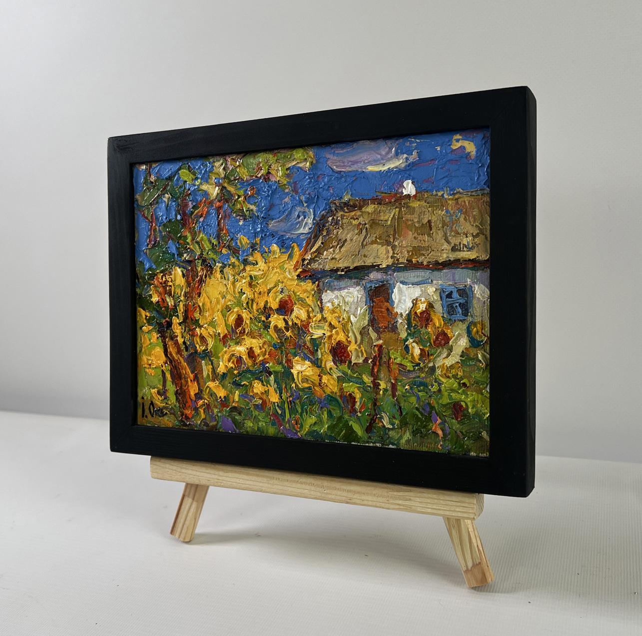 Vibrant Oil Painting House and Sunflowers by Oksana Ivanyuk in black frame