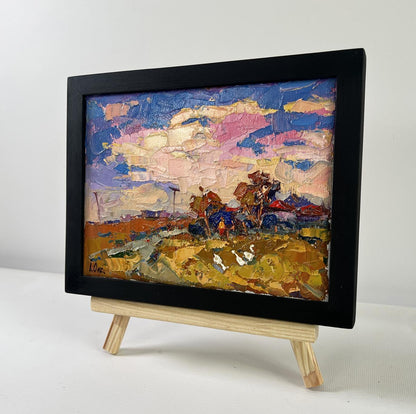 Oil painting Evening pink clouds by Oksana Ivanyuk in black frame