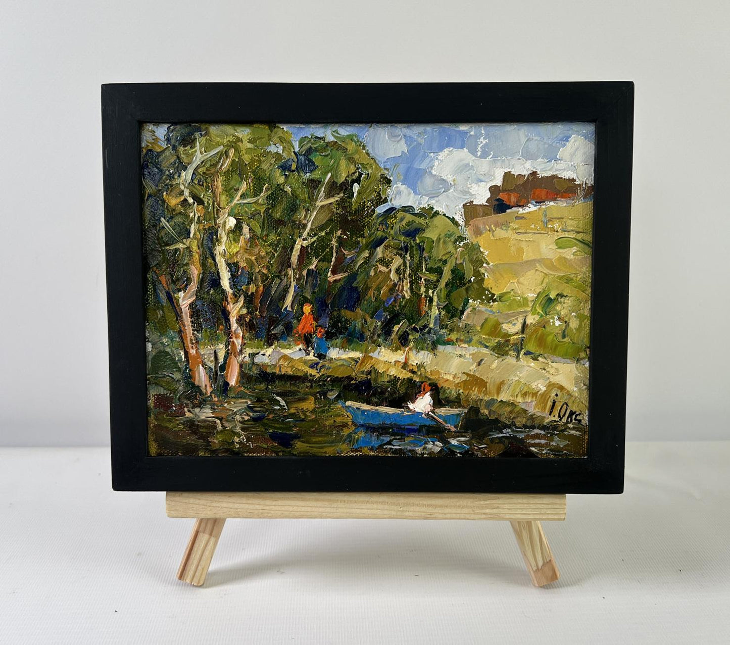 Oil painting of family vacation on lake by Oksana Ivanyuk