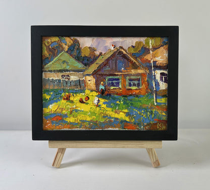 Vibrant impressionist oil painting Returning home by Oksana Ivanyuk in black frame on wooden easel