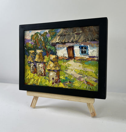 Oil painting Quiet summer morning by Oksana Ivanyuk in black frame on easel