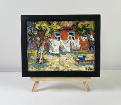 Oil painting Clothes are drying by Oksana Ivanyuk in black frame