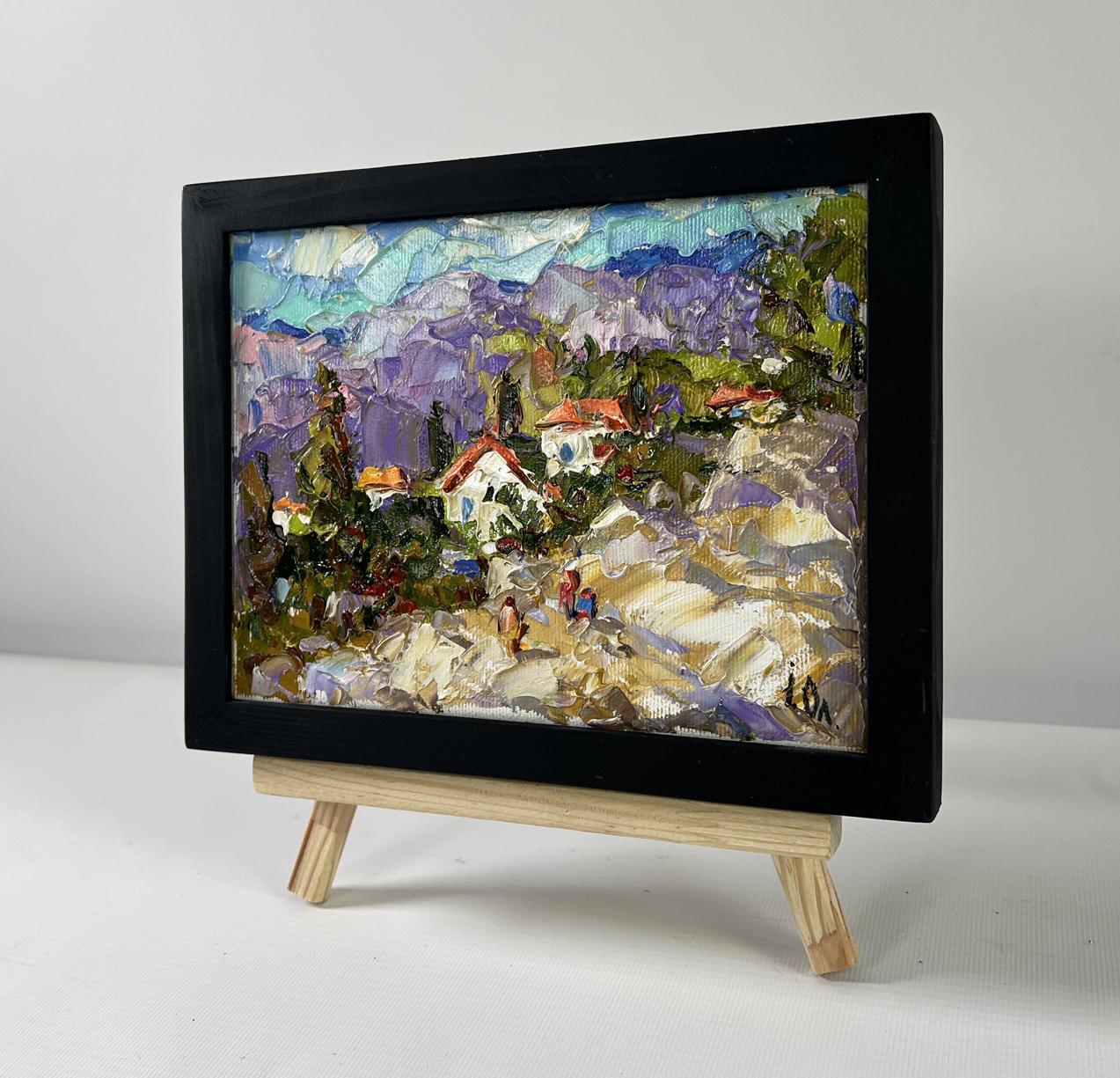 Oil painting Village among the mountains by Oleksiy Ivanyuk on easel