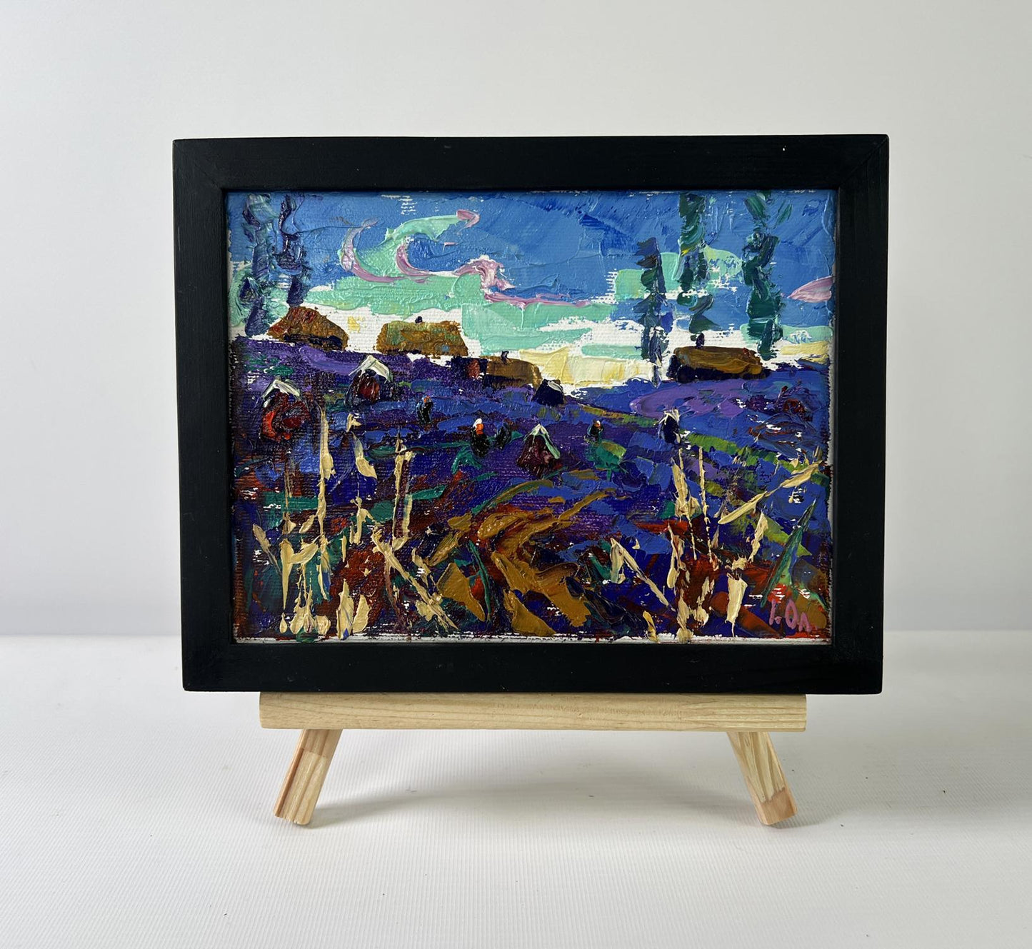 Oil painting Evening in the village by Oleksiy Ivanyuk in black frame