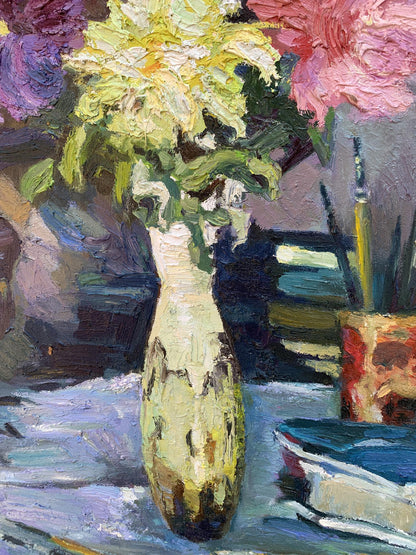 Oil painting of yellow pink flowers in cream ceramic vase by Boris Serdyuk