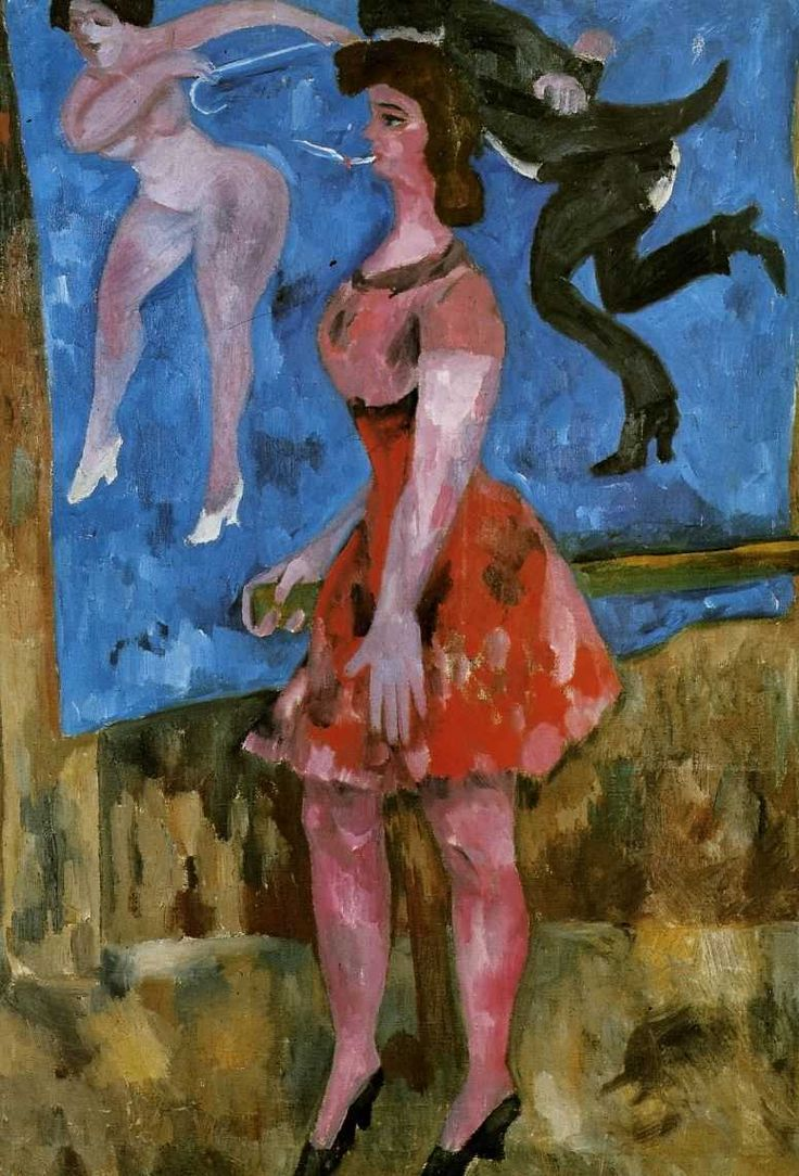 Woman in red floral dress and black heels before Mikhail Larionov blue canvas