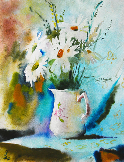 White ceramic pitcher with pink floral design holding chamomile bouquet by Egor Shvachunov