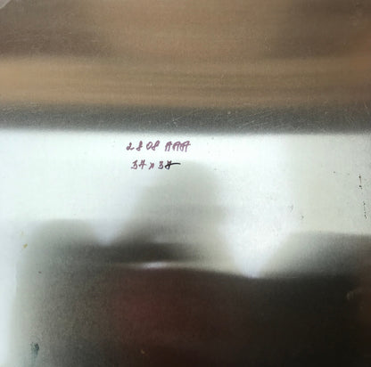 Back of Jesus Christ oil portrait by Alexander Litvinov with red handwritten markings on metallic surface