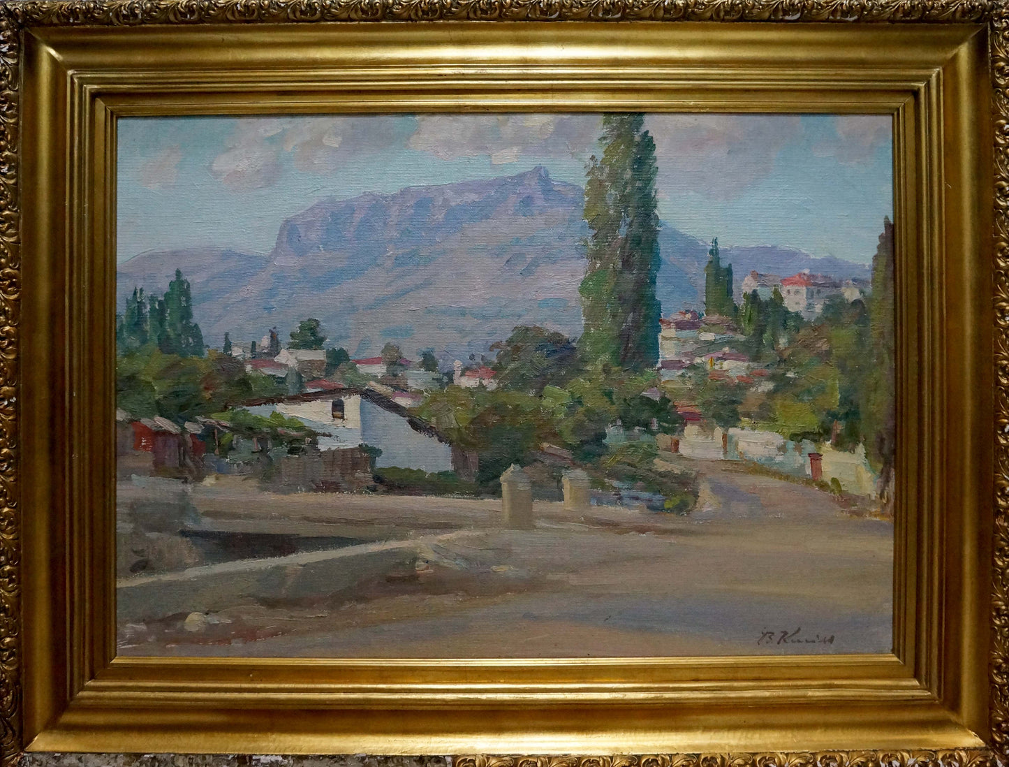 Oil painting by Kisel Ivan Gordeevich: sunlit village in ornate gold frame