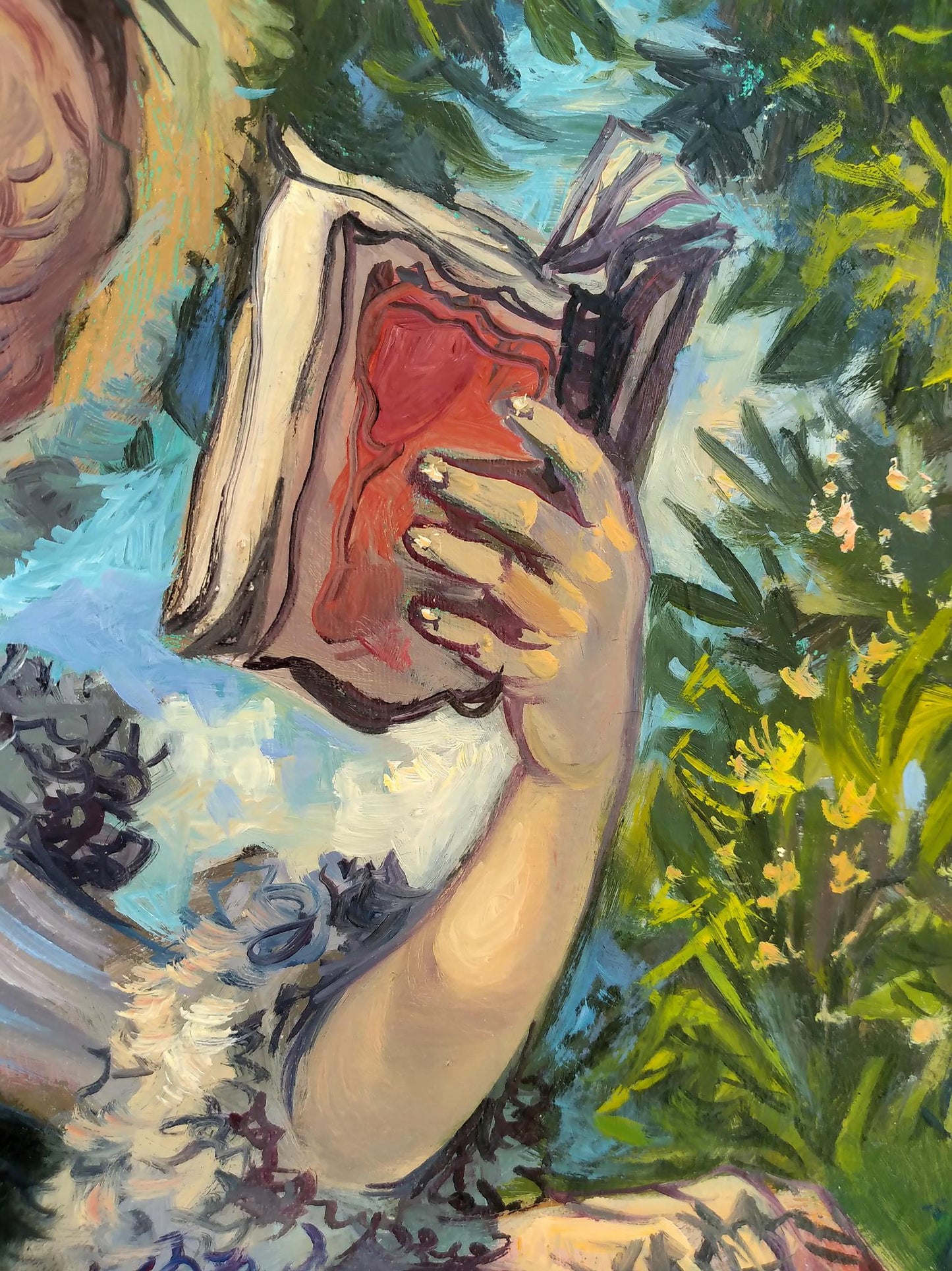 Oil painting of hand holding open red book on green background