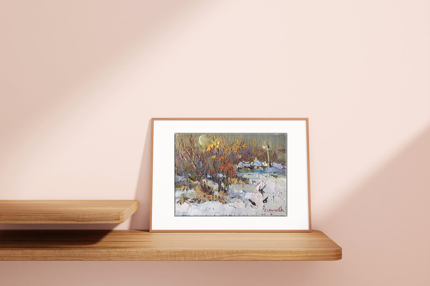 Framed oil painting of snowy village landscape by Oksana Ivanyuk