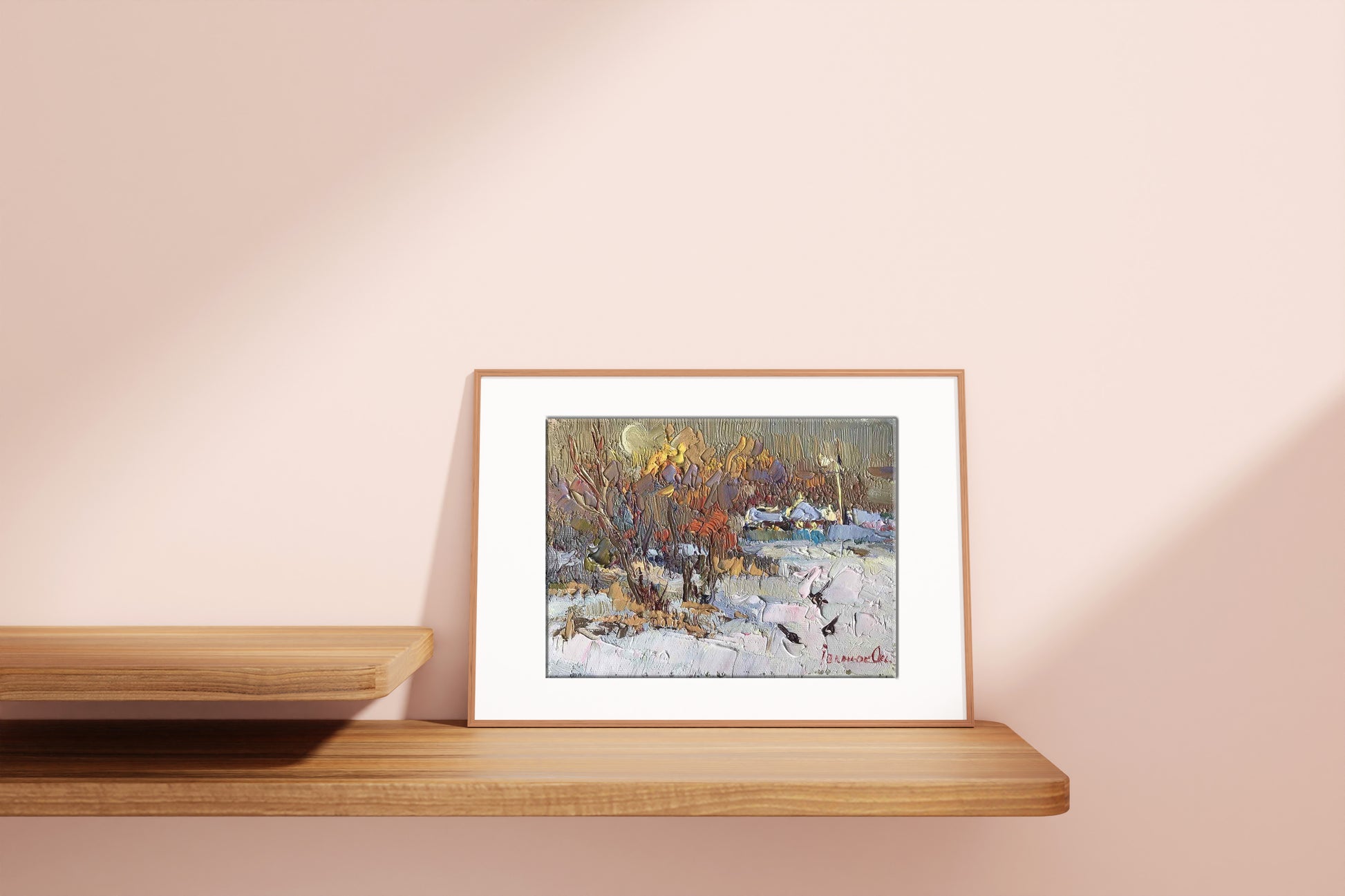 Framed oil painting of snowy village landscape by Oksana Ivanyuk
