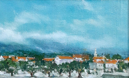 Oil painting of Vasily Korkishkos resort town near sea with white buildings