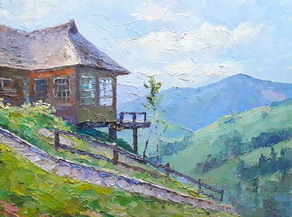 Custom rustic wooden cabin landscape painting on grassy hillside mountains