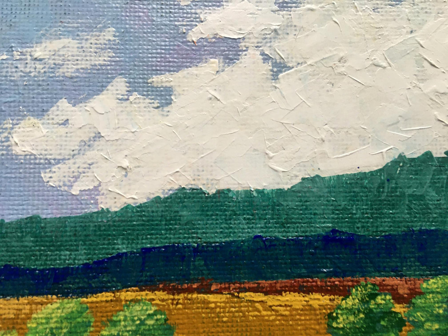 Oil painting Golden field by Zadorozhnya V.V. with clouds over green hills