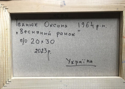 Back of Oil painting Spring morning by Ivanyuk Oksana, handwritten inscription on gray canvas, light wood frame