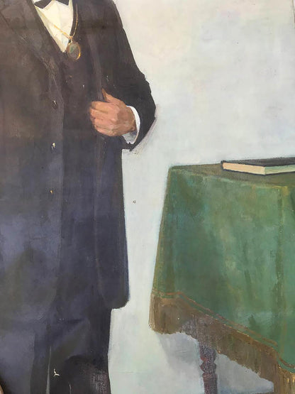 Oil painting of Karl Marx in dark navy wool overcoat with notched lapel