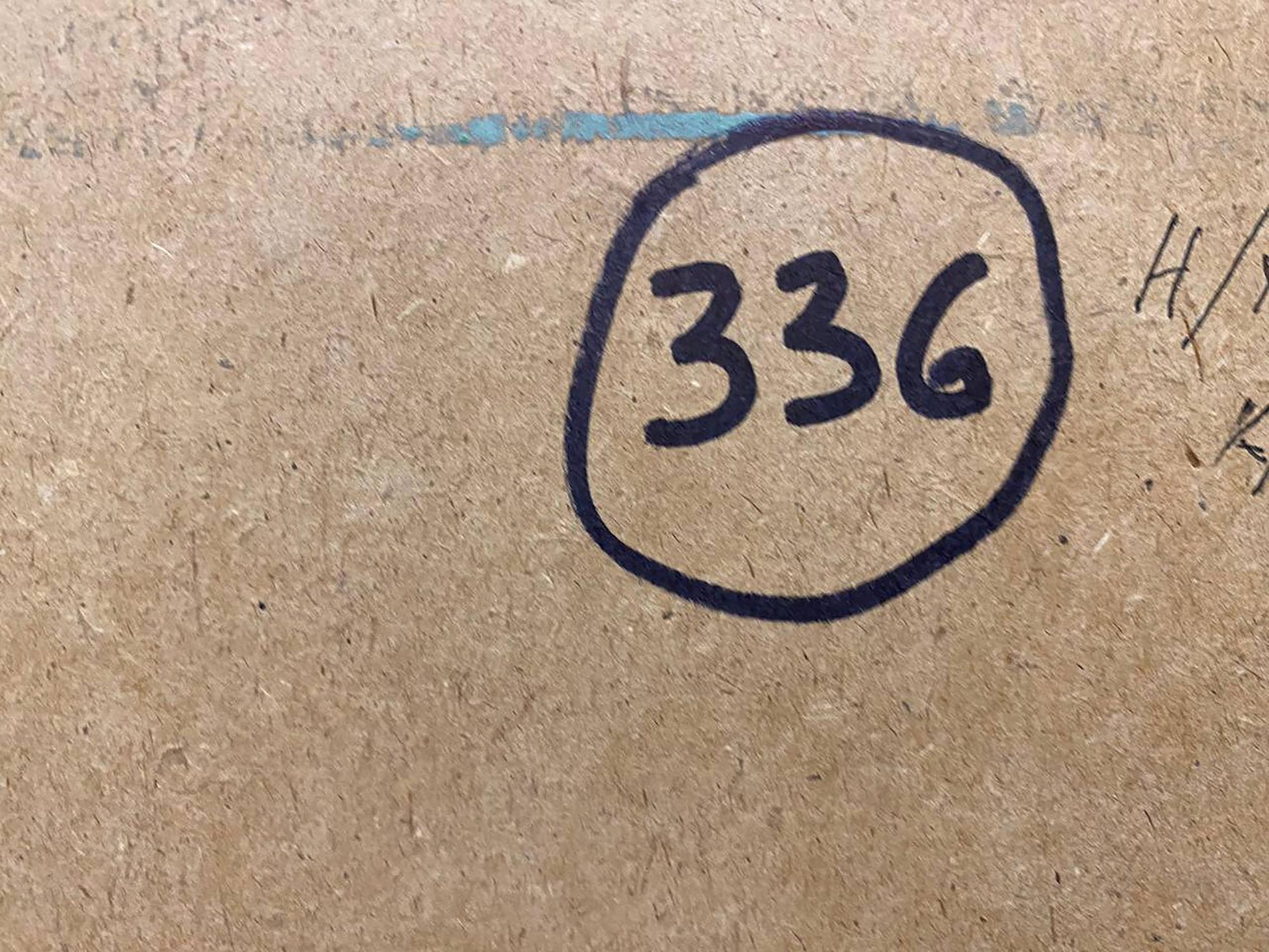 Black marker 336 in circle on back of rustic apple oil painting cardboard