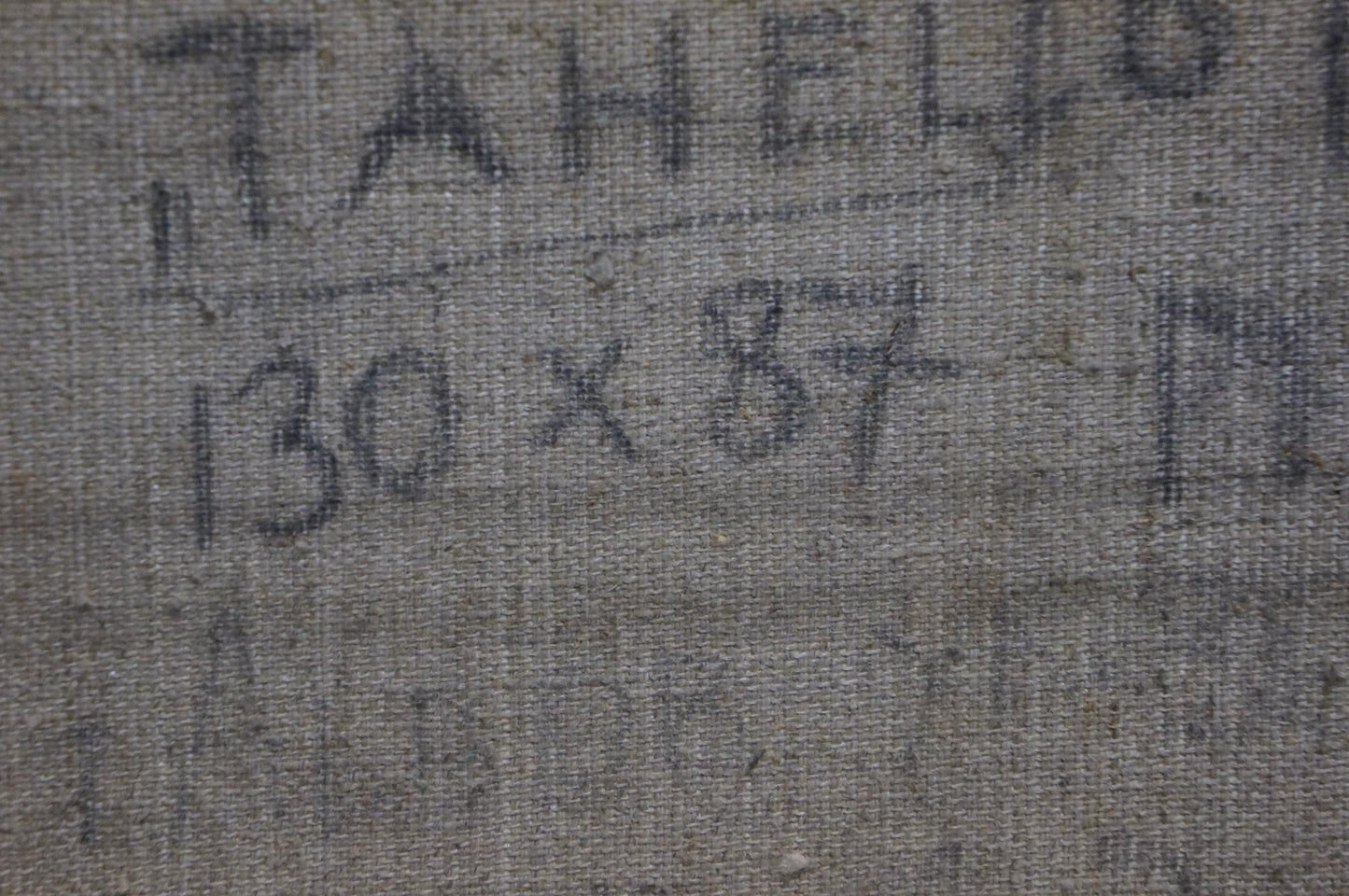 Back of Abstract oil painting Dance Golikov I.E. gray textured fabric with faded black handwritten markings