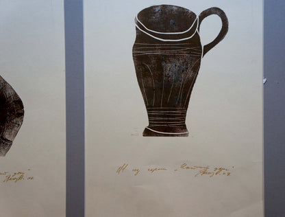 Dark brown hand-carved Albina Yaloz ceramic jug vase with handle