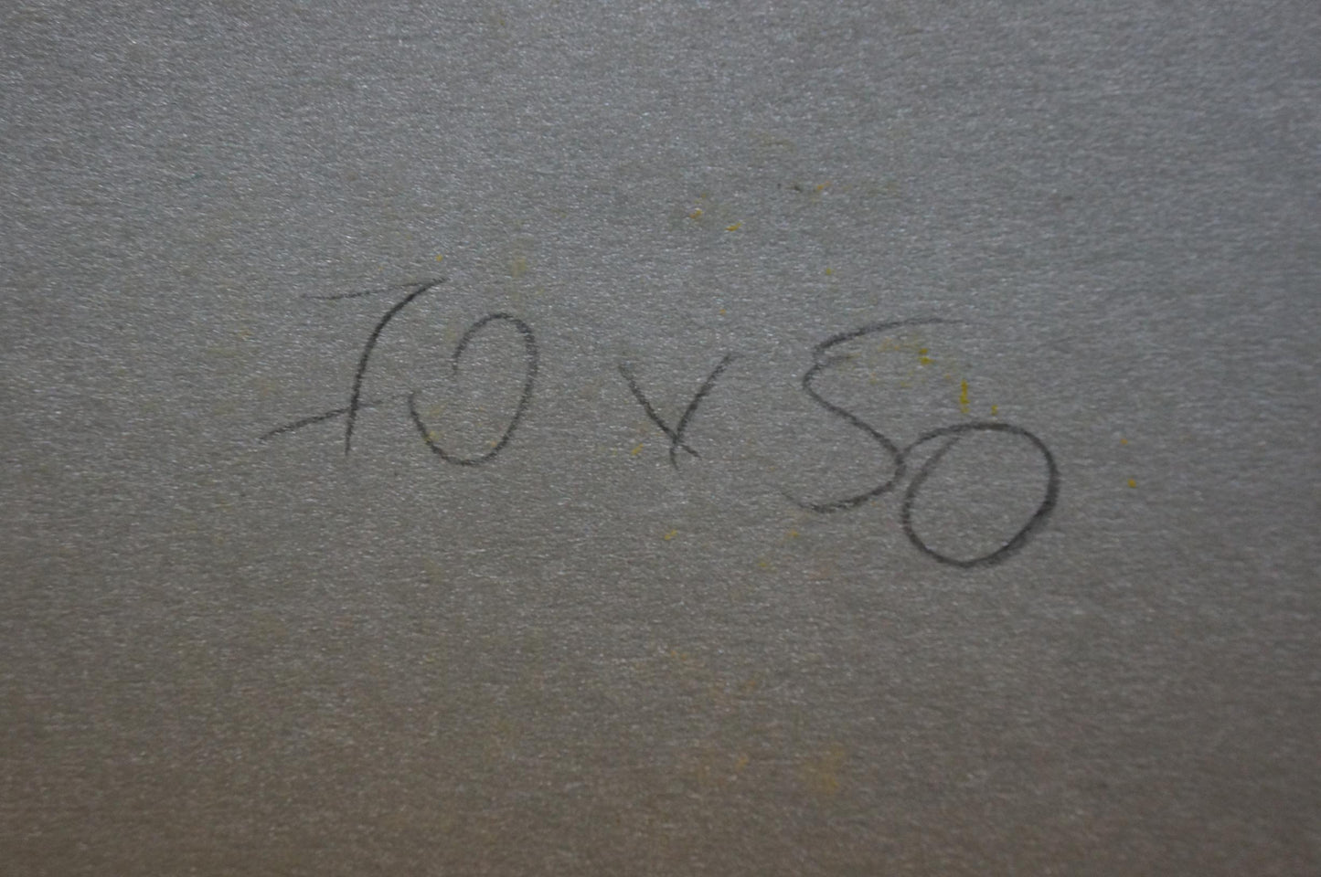 Back of Abstract painting Apple Tranquility Albina Yaloz with handwritten 10 x 50 in dark pencil on gray textured surface