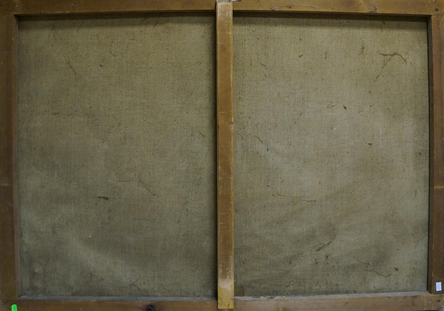Back of two-panel wooden-framed canvas with grayish-green fabric, Ship in the storm oil painting