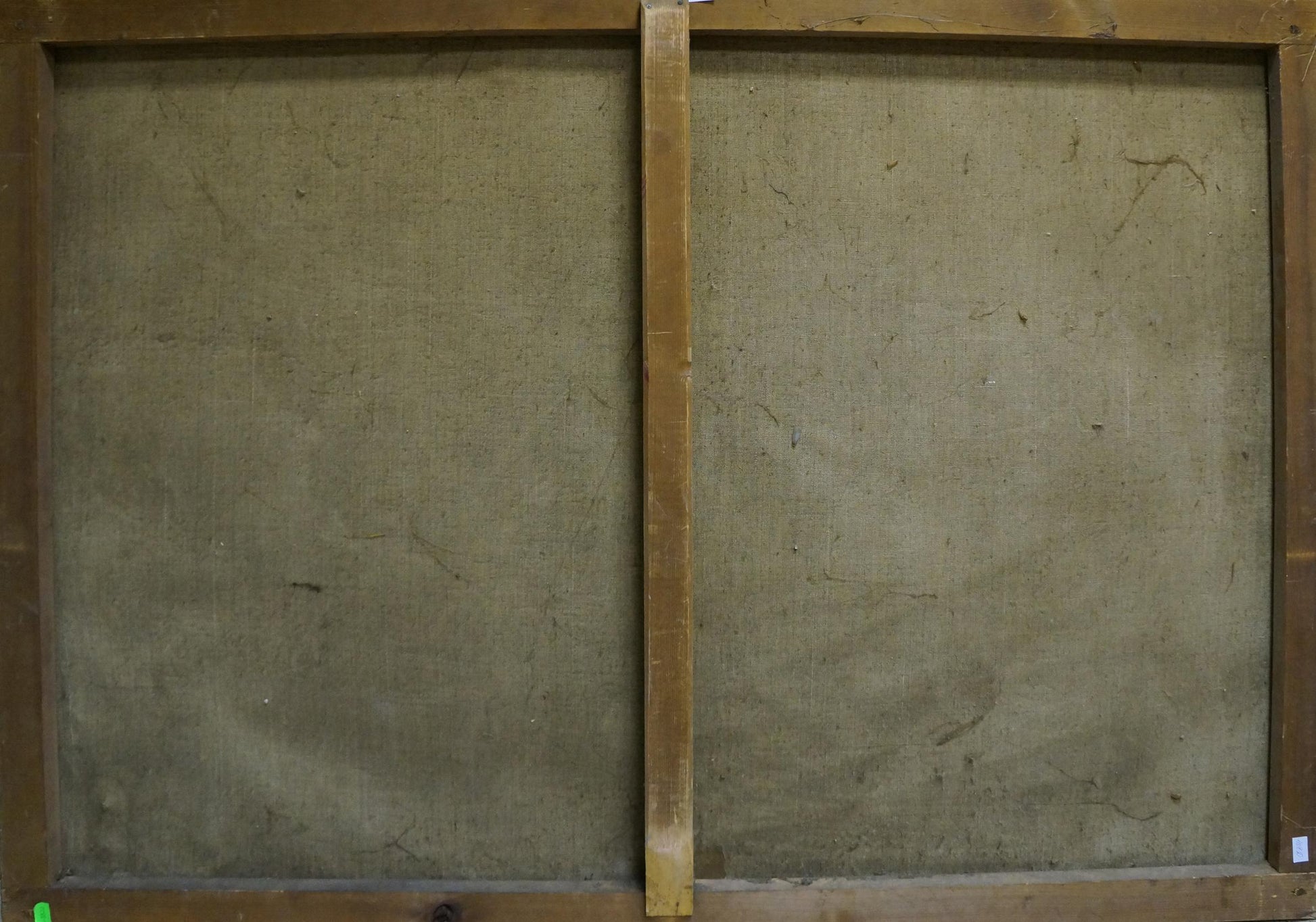 Back of two-panel wooden-framed canvas with grayish-green fabric, Ship in the storm oil painting