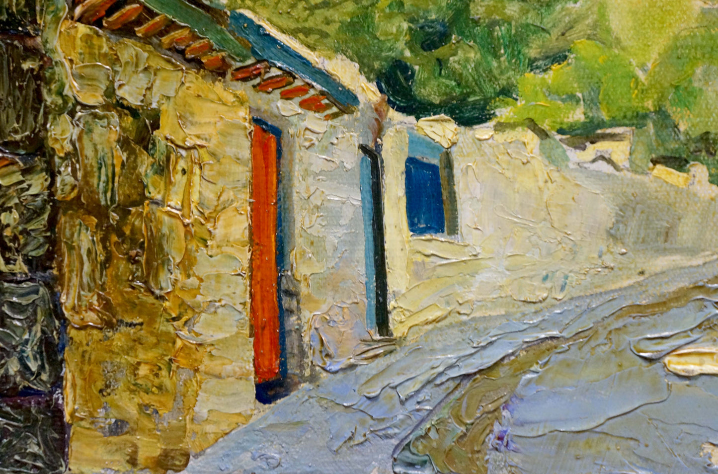 Oil painting by Miroshnichenko Pavel Petrovich: vibrant orange door on sunlit stone wall