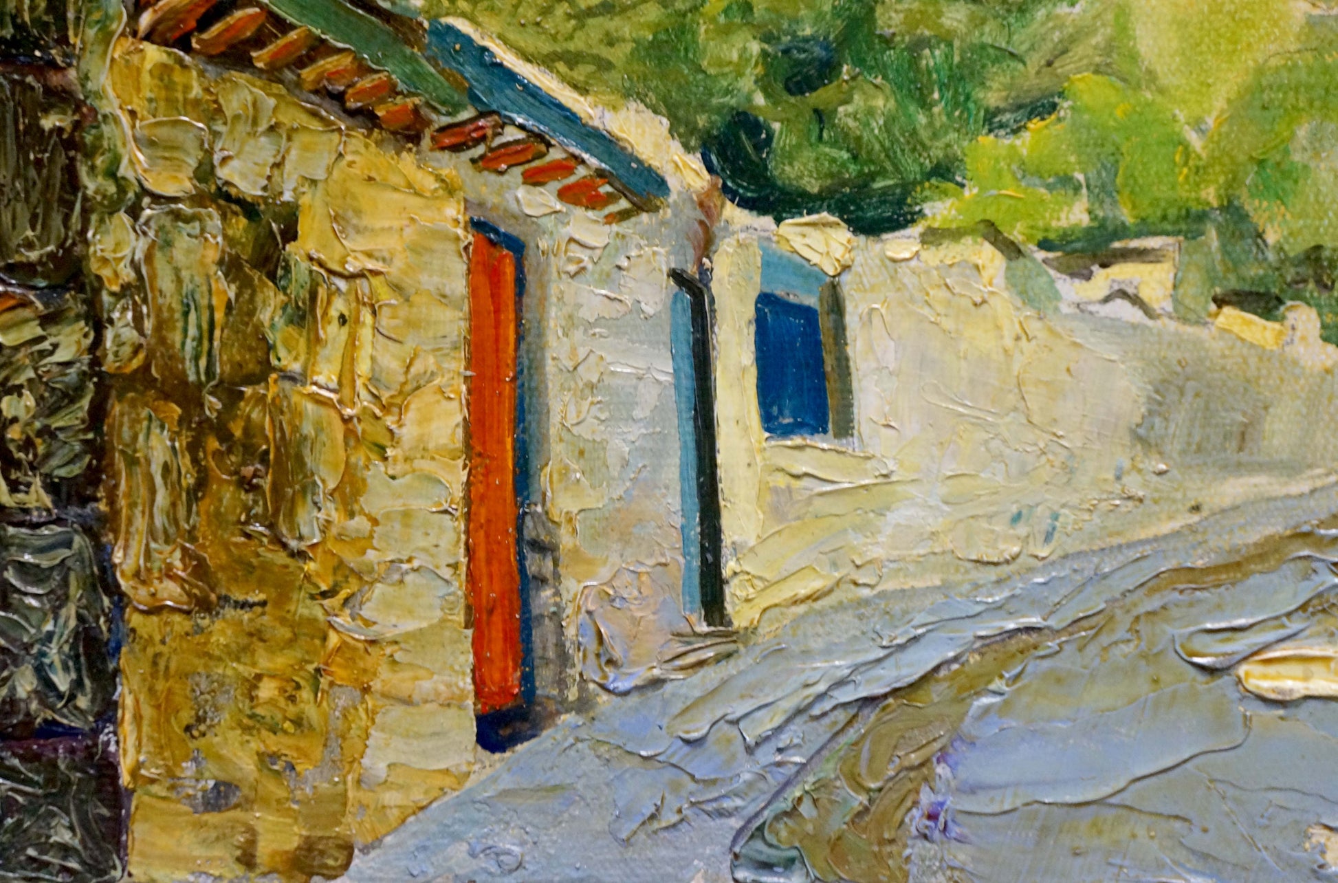 Oil painting by Miroshnichenko Pavel Petrovich: vibrant orange door on sunlit stone wall