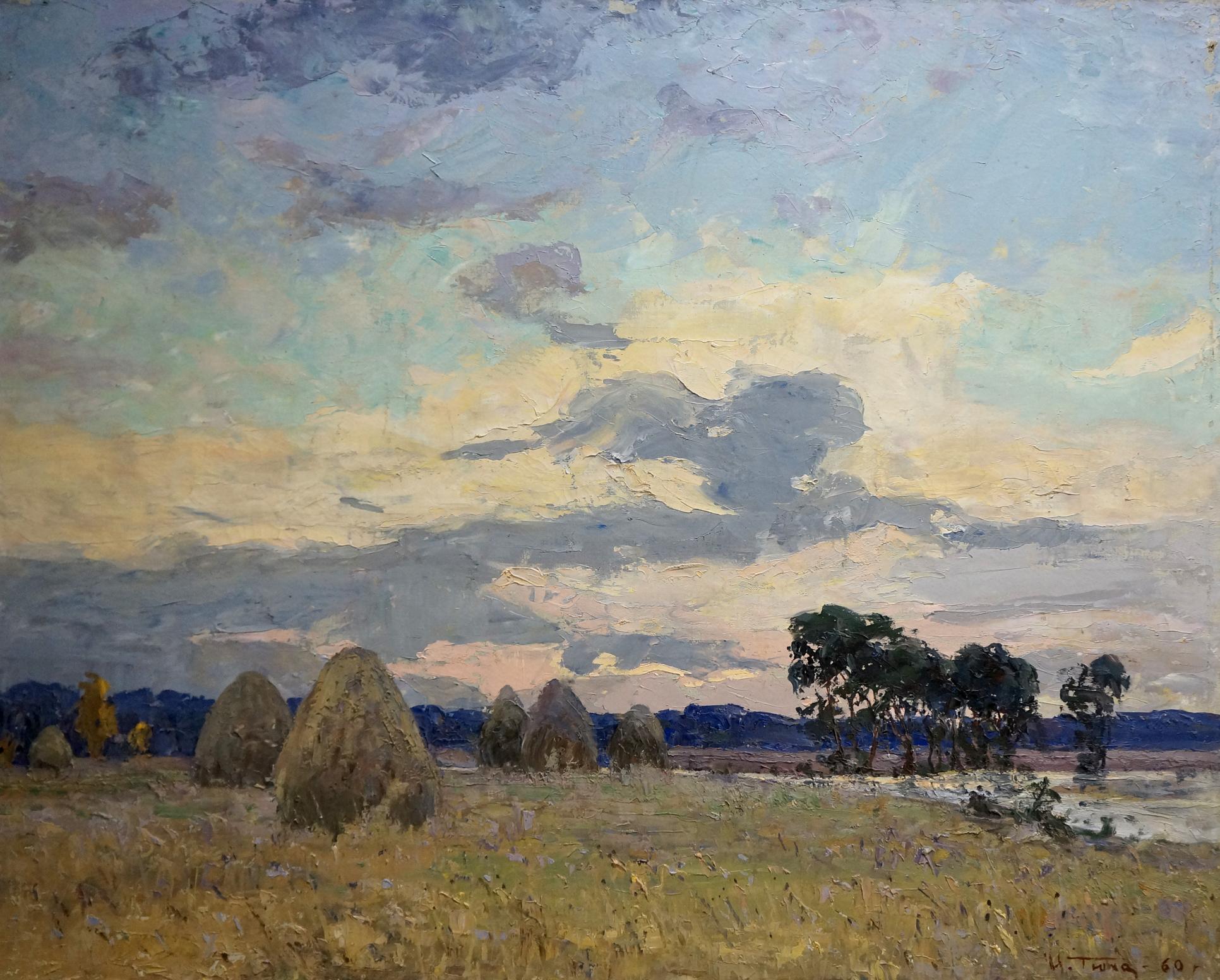 Oil painting by Tyukha Ivan Andreevich: golden hay bales under vast sky