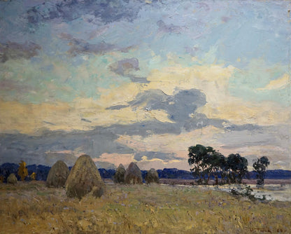 Oil painting by Tyukha Ivan Andreevich: golden hay bales under vast sky