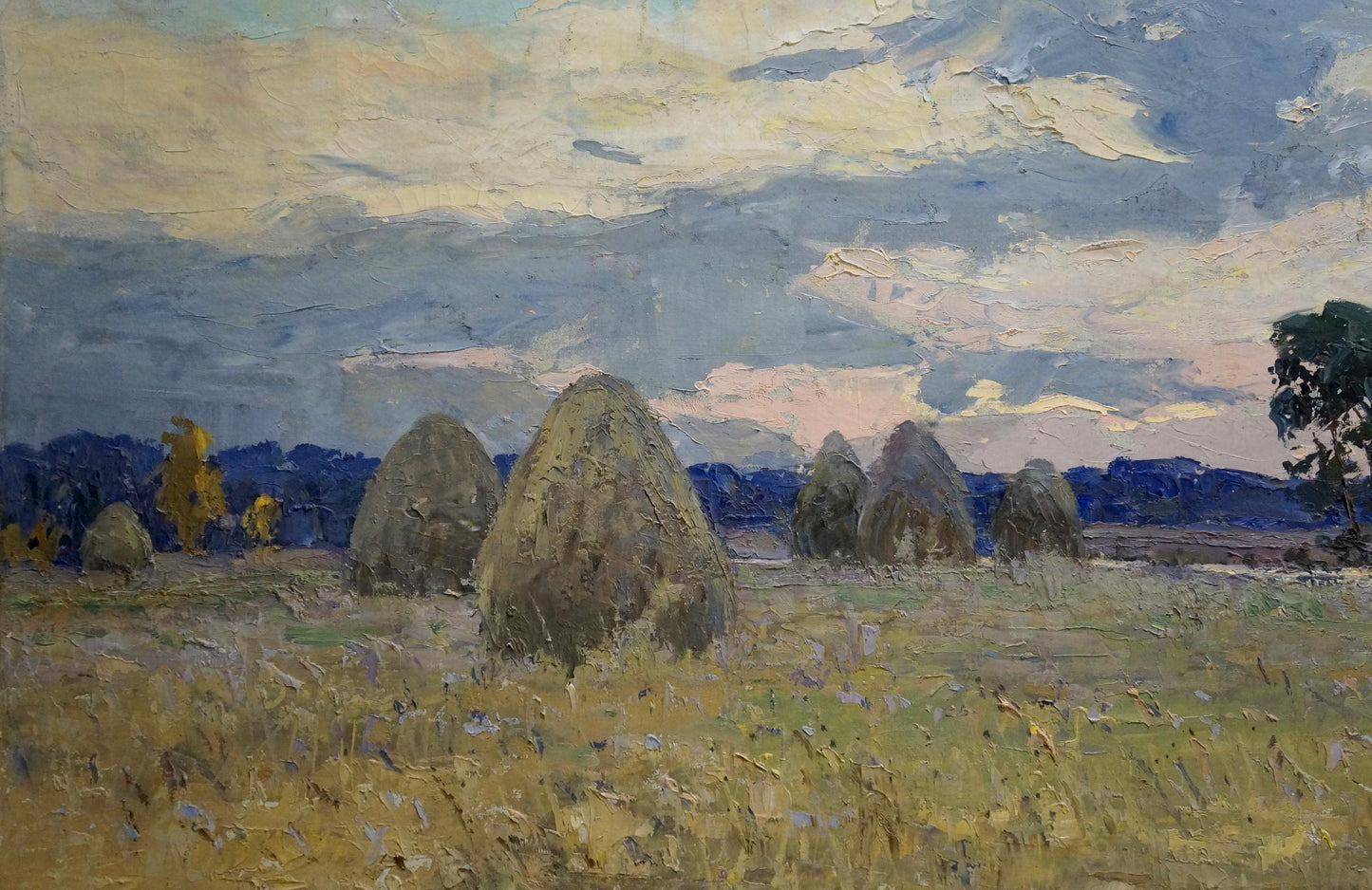 Oil painting by Tyukha Ivan Andreevich: golden hay bales under dramatic cloudy sky