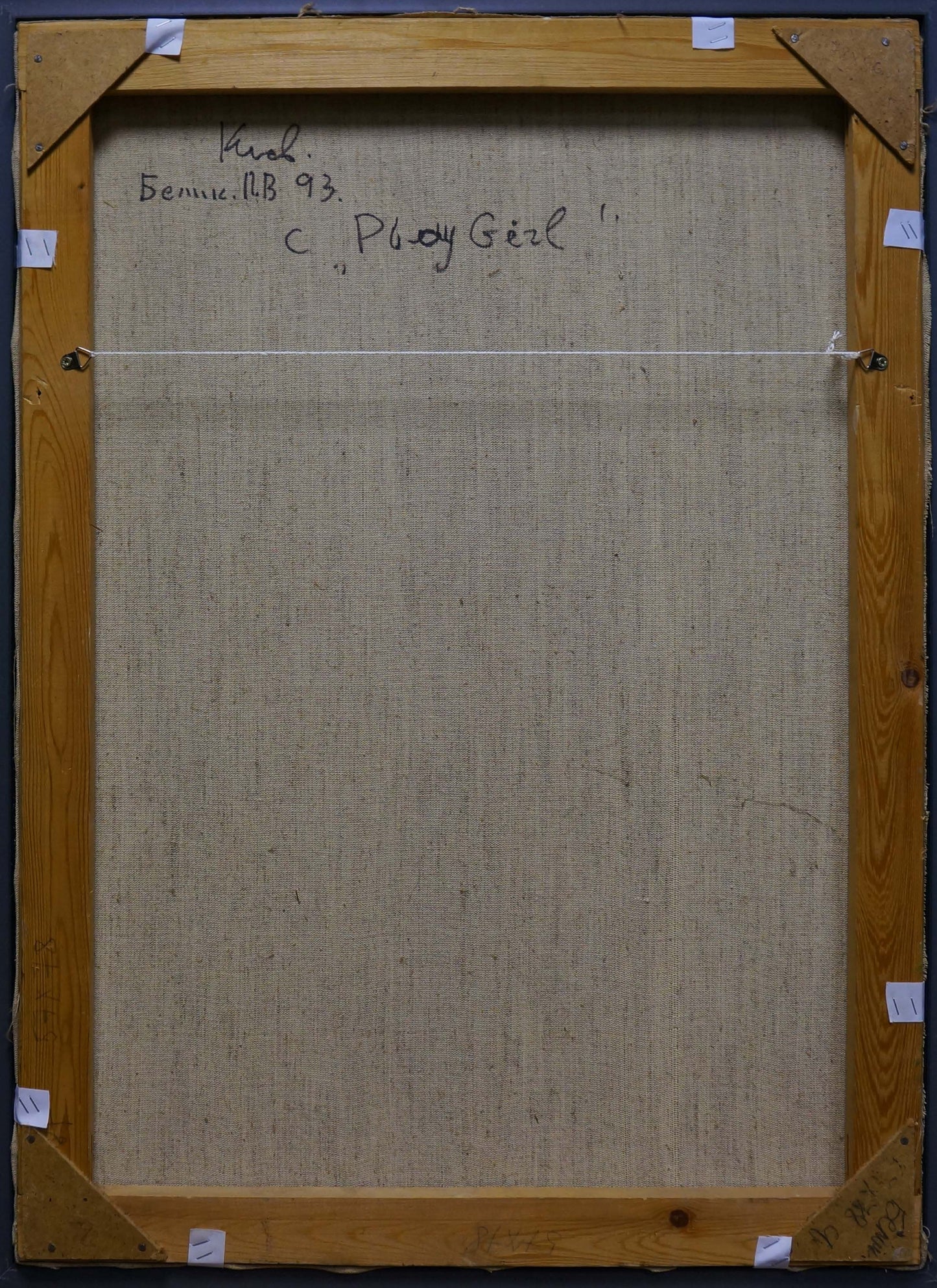 Back of wooden-framed canvas Portrait of female figures Belyak P. V. with beige backing and handwritten inscription