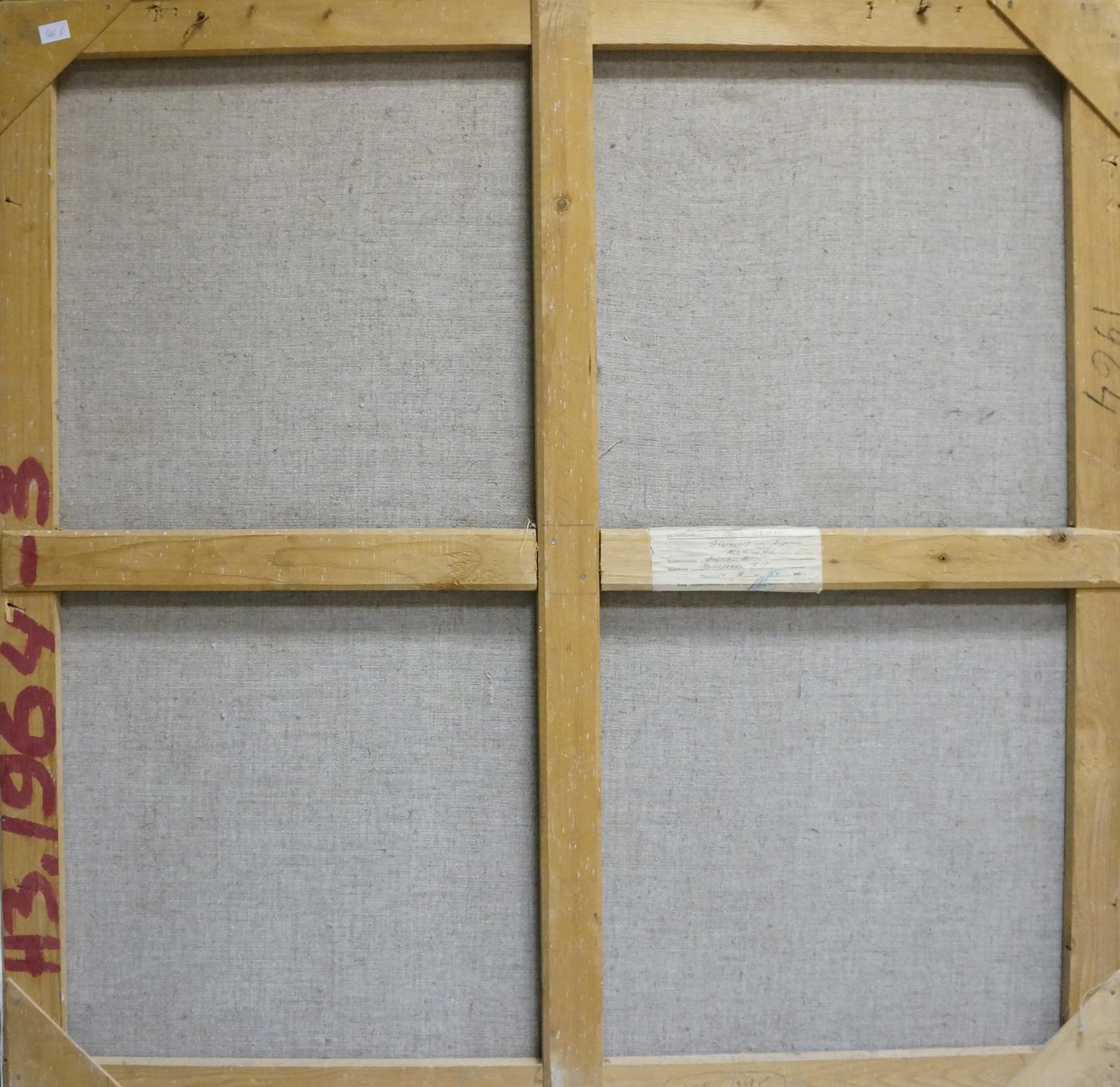 Back of framed Oil painting Near the shore by Nesterenko Boris Grigorievich with light wood stretcher bars and gray fabric backing