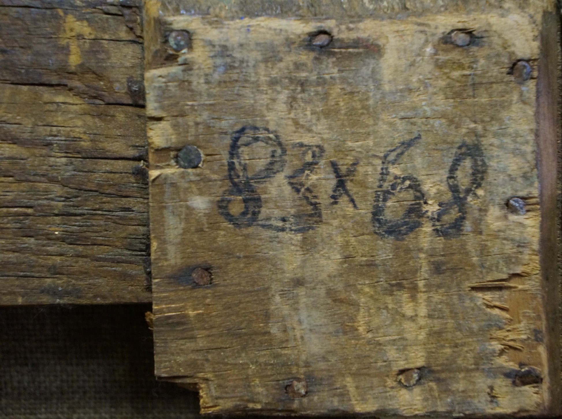Back of Eremin Boris Alexandrovich oil painting on weathered plank with rusted bolts