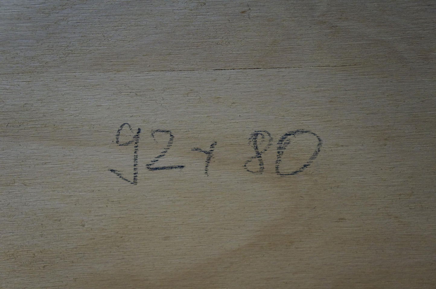 Back of Oil painting House in the woods: Handwritten 92 x 80 in dark ink on light wood