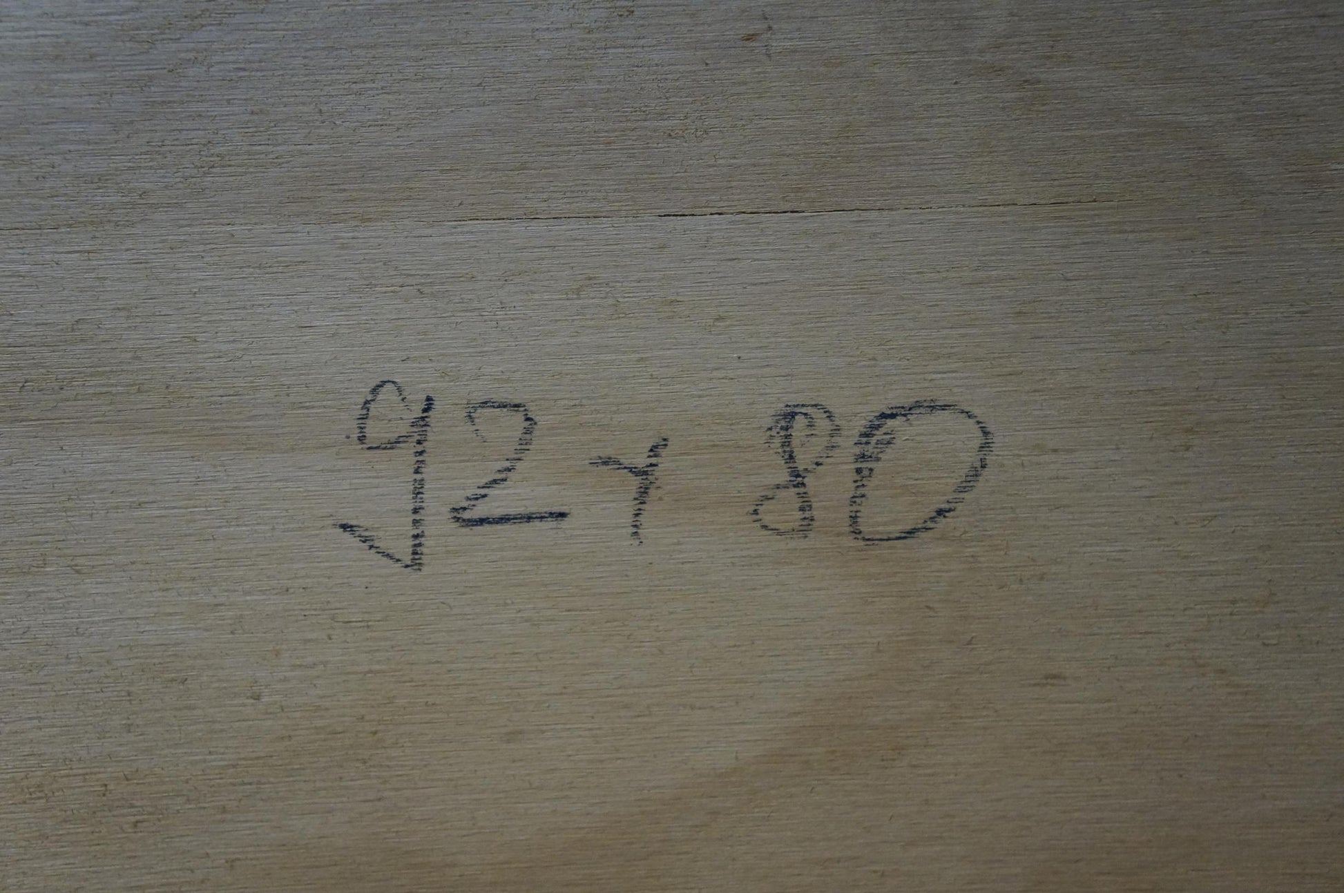 Back of Oil painting House in the woods: Handwritten 92 x 80 in dark ink on light wood